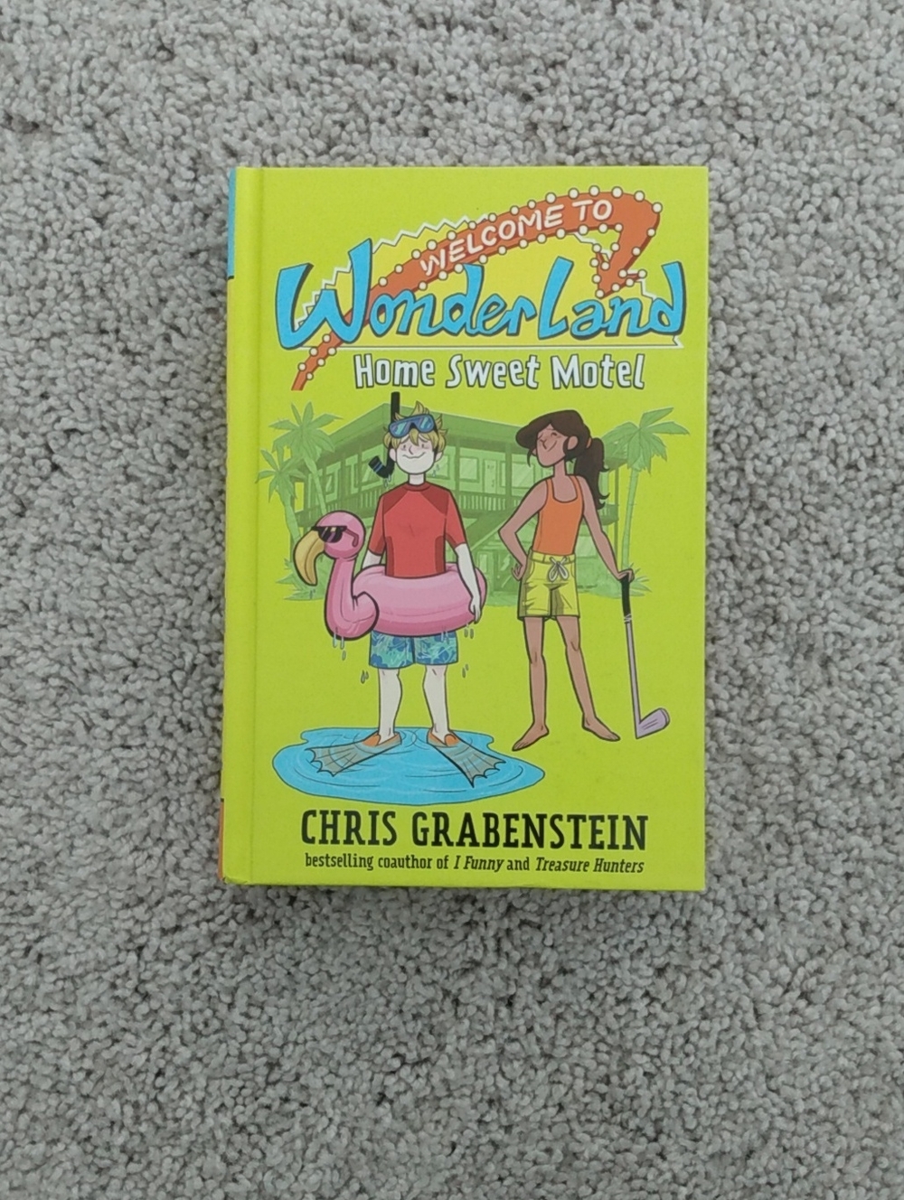 WonderLand: Home Sweet Motel by Chris Grabenstein - Bright Yellow Hardcover
